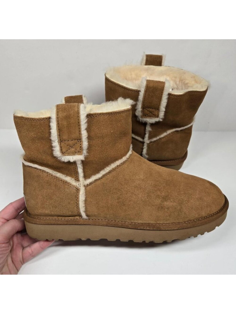 UGG Classic Mini spill seam boots. in chestnut brown. size 10.